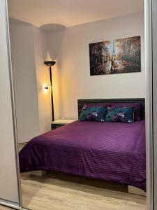 Postel nebo postele na pokoji v ubytování Jokica apartmani