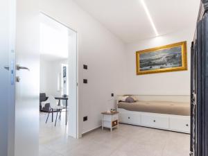 a bedroom with a bed and a table at Dimora Molino Galeotto , Giardino e vista Appennino in Pavullo nel Frignano +34 photos