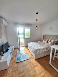 Postel nebo postele na pokoji v ubytování Apartment Lake story