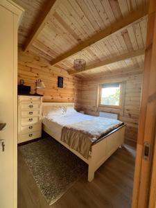 Ένα ή περισσότερα κρεβάτια σε δωμάτιο στο The Greenbanks Escape