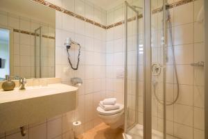 A bathroom at Alpenhof Landhotel Restaurant