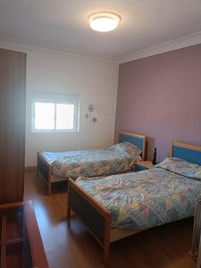 Postel nebo postele na pokoji v ubytování El Refugio de Alcubierre