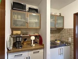 Kuchyň nebo kuchyňský kout v ubytování Gschwendtnerhof App9 Hoffmann