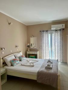 Voodi või voodid majutusasutuse Hotel Lenox toas