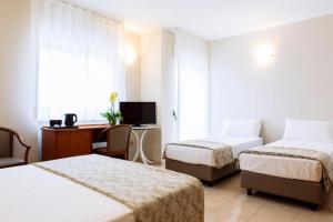 Postel nebo postele na pokoji v ubytování Easy Green Hotel + 37 fotografií
