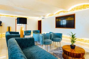 TV a/nebo společenská místnost v ubytování Aparthotel Amella