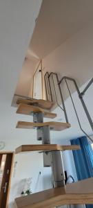 Kuchyň nebo kuchyňský kout v ubytování Apartamenty Drewniaki