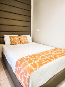Hotel y Cabañas Covemar客房内的一张或多张床位