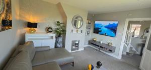 Φωτογραφία από το άλμπουμ του Luxury 3-Bed w- garden & game Room 5 mins from Chester σε Saltney