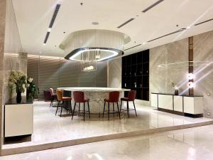 Gallery image of Luxe Eleve Duplex 14th patio 4 in Gurgaon