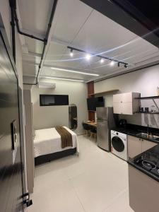 Piccola camera con letto e cucina. di Studio Loft 08 novo e aconchegante, Gaspar centro, 15 minutos de Blumenau a Gaspar