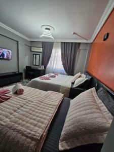 Ένα ή περισσότερα κρεβάτια σε δωμάτιο στο Aras Hotels Çorlu