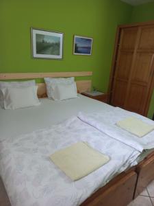 Postel nebo postele na pokoji v ubytování Hostel Bata