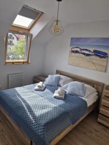 Ένα ή περισσότερα κρεβάτια σε δωμάτιο στο Apartament Marco