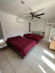 Postel nebo postele na pokoji v ubytování Casa Palomo, Ixtapa Zihuatanejo