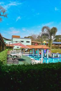 Swimmingpoolen hos eller tæt på Hotel Meu Paraíso