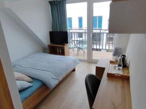 Ένα ή περισσότερα κρεβάτια σε δωμάτιο στο Bachus