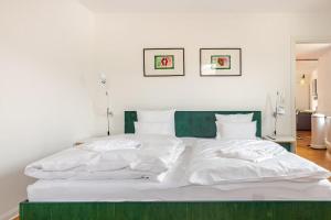 Postel nebo postele na pokoji v ubytování Klimatisierte Wohnung mit großer Terrasse