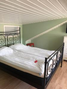 Letto o letti in una camera di Rum mitt stan