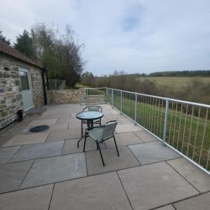 En balkon eller terrasse på Stapehead Farm