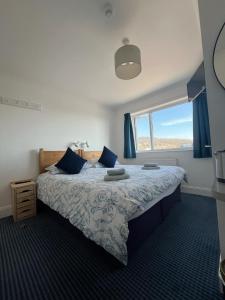Postel nebo postele na pokoji v ubytování Lucerne B&B + 19 fotografií