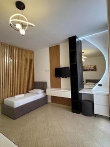 Postel nebo postele na pokoji v ubytování Eden Hotel