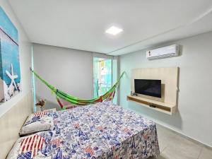 TV a/nebo společenská místnost v ubytování Casa Completa na Beira-Mar de Tamandaré - Praia dos Carneiros