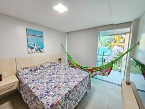 Postel nebo postele na pokoji v ubytování Casa Completa na Beira-Mar de Tamandaré - Praia dos Carneiros + 28 fotografií