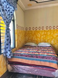 Postel nebo postele na pokoji v ubytování Hotel Henderson