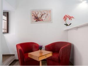 A seating area at B&B La Via dei Mulini