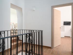 A television and/or entertainment centre at B&B La Via dei Mulini