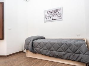 A bed or beds in a room at B&B La Via dei Mulini