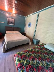 Postel nebo postele na pokoji v ubytování Gîte d'étape Lamandoze