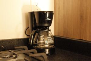 a coffee maker sitting on top of a counter at Loft Alberca in Chapultepec in Guadalajara
