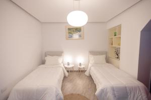 Postel nebo postele na pokoji v ubytování Apartment KLER-Elegant Stay Ali Demi