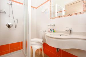 Vannituba majutusasutuses Hotel Miorelli