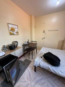 Postel nebo postele na pokoji v ubytování Emanet Apartel