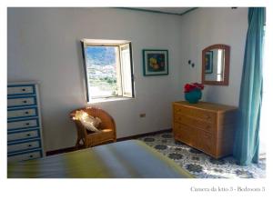 Postel nebo postele na pokoji v ubytování Villa Donatella