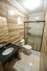 Ένα μπάνιο στο Suites Jatiuca