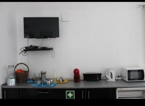 Dapur atau dapur kecil di Mont' Sobro Hostel