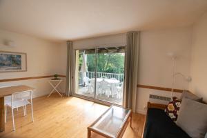 Posezení v ubytování Appartement n 24 pour 4 à 6 personnes plages à pied + 20 fotografií