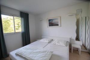 Postel nebo postele na pokoji v ubytování Appartement n 24 pour 4 à 6 personnes plages à pied