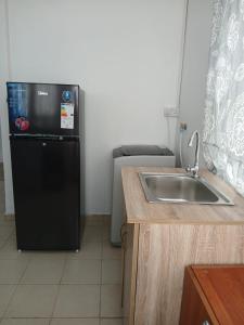 Kuchyň nebo kuchyňský kout v ubytování Gris Gris Guest House