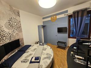 a bedroom with a large bed in a room with a window at IL Grattacielo Di Genova in Genoa