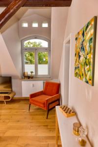 Ein Sitzbereich in der Unterkunft Apartmenthaus am Dom mit Parkplatz