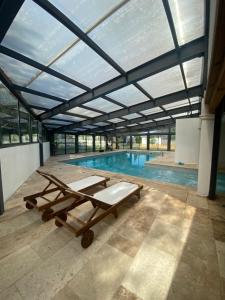 Bazén v ubytování O Bain Soleil nebo v jeho okolí