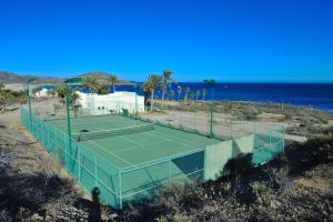 an overhead view of a tennis court on the beach at Villa Langosta by Cabo Villas in La Paz
