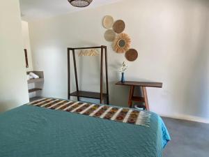 Postel nebo postele na pokoji v ubytování Gecko Hotel