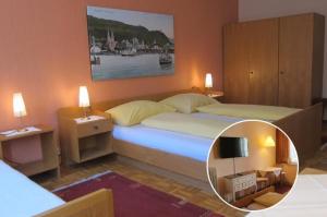 a bedroom with a large bed with a mirror at Pension Sonne Bed in Bregenz