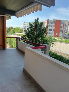 a balcony of a building with a view of a city at Il Triangolo in Termoli